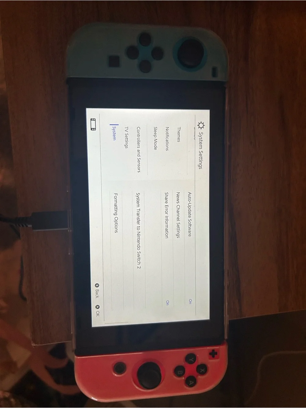 Nintendo Switch Console with Neon Red & Neon Blue Joy-Con Controllers
